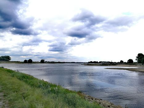 Main bridge over the channel in Nijmegen, Netherlans under a dramatic sky