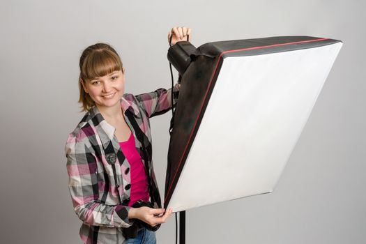 Photographer studio sets the correct direction of light softbox