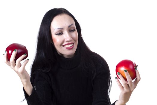 Pretty woman with an apple in his hand on a white background