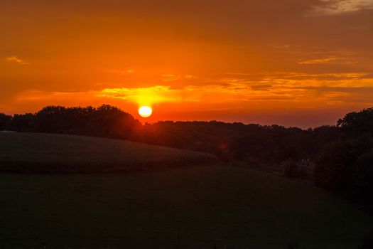 Evening glow, beautiful reddish color of the evening sky at the low sun.