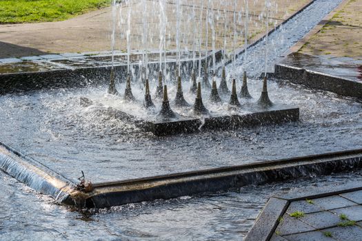 Artificially designed waterfall, fountain - Fountain in a park.