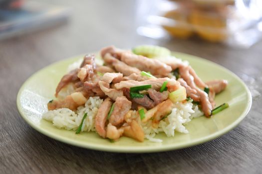 Fried Pork with Garlic Pepper on Rice, Thai food.