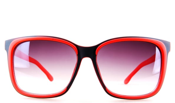 Pink sunglasses isolated on white.