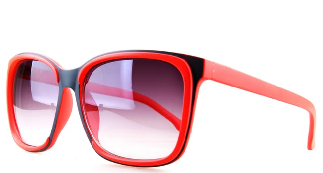 Pink sunglasses isolated on white.