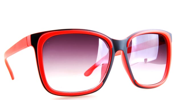 Pink sunglasses isolated on white.