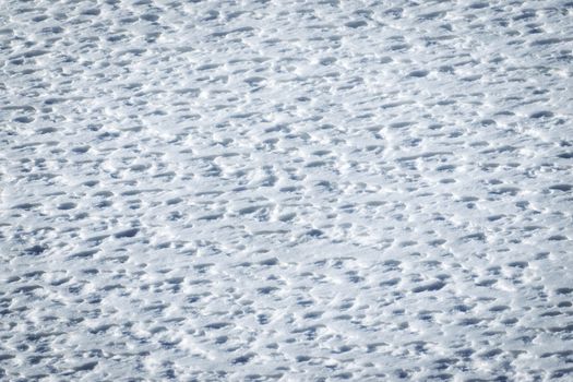 abstract winter background warm by wind pleated snow
