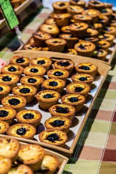 Taiwanese baked egg tart  on display at a snight market stall