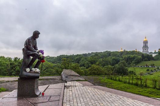 Monument to the military pilots (World War II) with a statue of famous soviet actor Leonid Bykov in Pechersk (Kiev, Ukraine).
Kiev Pechersk Lavra is on the background.