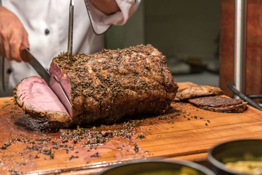 Carving of Wagyu beef roast