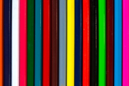 Vertical colourful stripes of multicoloured wooden pencils background background for presentations