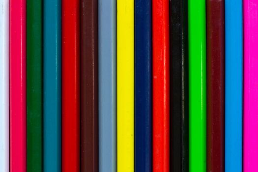 Vertical colourful stripes of multicoloured wooden pencils background background for presentations