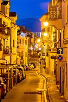 Town of Volosko street evening vertical view, Opatija riviera in Croatia