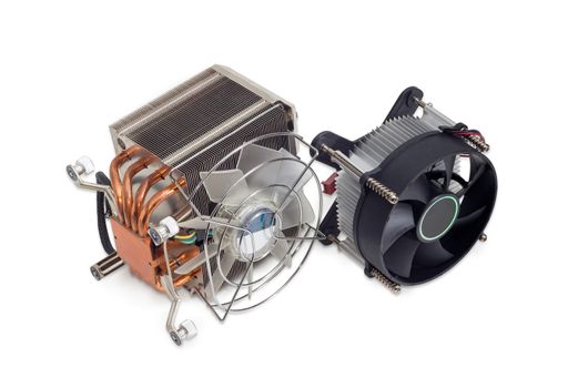 One active CPU cooler with large finned heatsink, fan, copper thermal pad with heat pipes, one cooler with fan and aluminum finned heatsink on a light background
