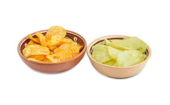 Potato chip flavored paprika and wasabi in two different ceramic bowls on a light background
