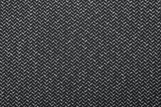 Black and white herringbone fabric pattern texture background closeup