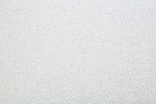 Macro shot of a terrycloth texture background. white Textile floor covering. Grey Knotted-pile carpet