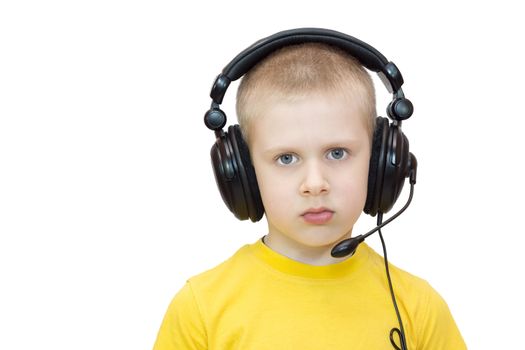 The photo depicts a child with a headset on a white background