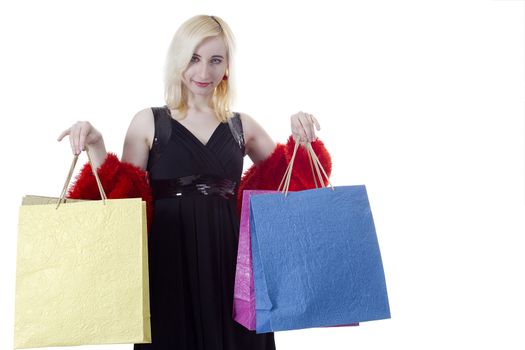 Photo of glamorous shopper with lots of bags isolated on white background