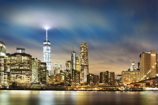 New York City - beautiful sunrise over manhattan with manhattan and brooklyn bridge USA