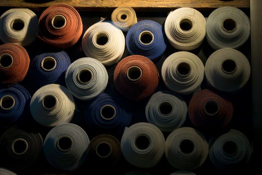 Assorted colored rolls in a shop of textile