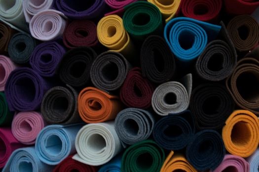 Assorted colored rolls in a shop of textile