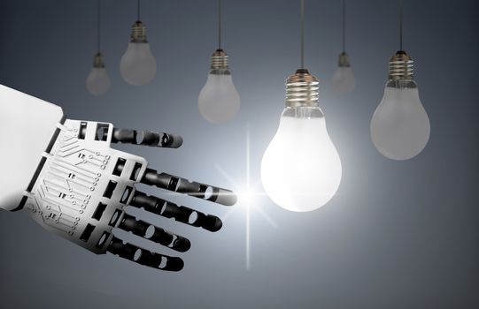 Robots hand touching a lit bulb creating a spark