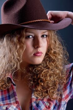 Young attractive woman on isolated background in the studio