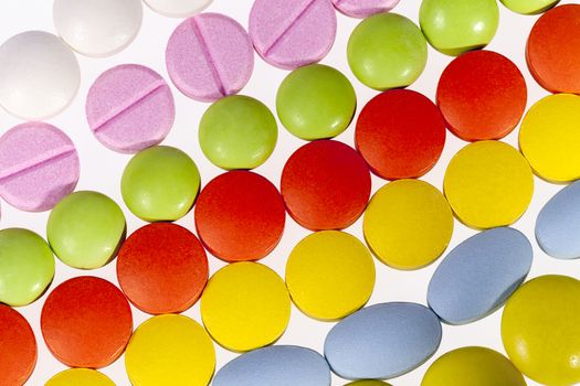 Background of colorful medical pills.