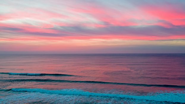 Aerial from a beautiful sunset at Vale Figueiras beach in Portugal