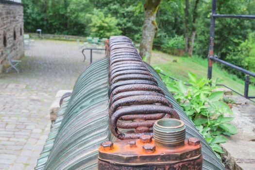 Ancient filter press of individual cast iron clothes. Press for solid-liquid separation.