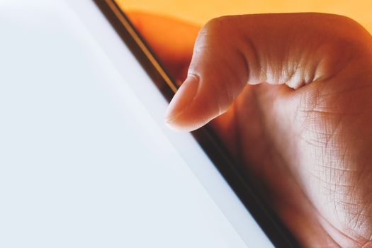 image of hand using digital tablet close up, social media life