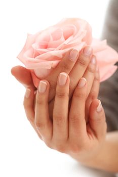 Skin care. Hands with pink rose head