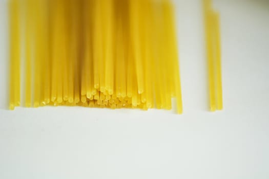 raw italian Pasta spaghetti on white background