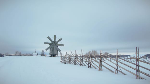 Wooden windmill in the village in the North of Karelia