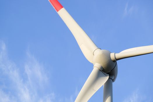 close up of a windmill and a blue sky