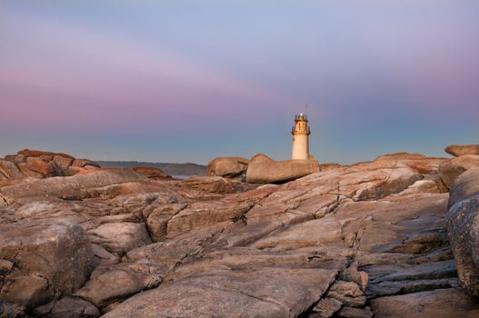 The lighthouse of Muxia at sunset. Muxía, A coruna, Spain