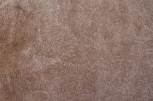 Brown leather texture closeup. Useful as for background.