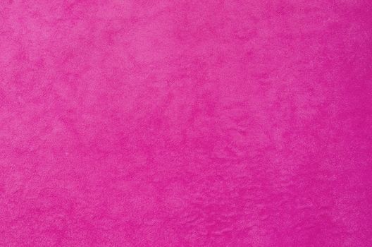 Pink leather texture closeup. Useful as for background.