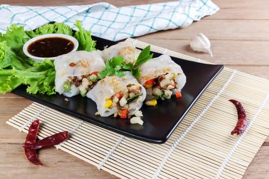 Noodle tube is appetizer menu Asia. made from noodle stuffed with pork and vegetables cooking by steamed.