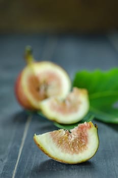 Portion of fresh Figs on wooden background