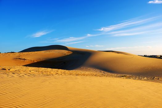 Wonderful landscape for Vietnam travel, abstract with shape of Bau Trang sand hill under sky in summer, a beautiful place for tourism, sand desert so amazing