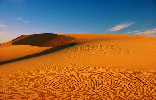 Wonderful landscape for Vietnam travel, abstract with shape of Bau Trang sand hill under sky in summer, a beautiful place for tourism, sand desert so amazing