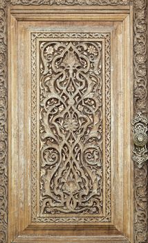 Close-up of a traditional carved wooden door, Uzbekistan