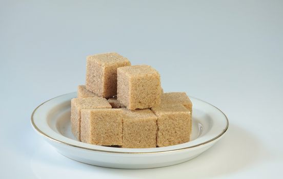 pieces of cane sugar close to