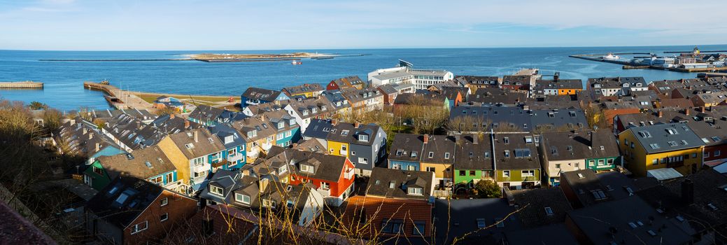 Panorama of residential area in Heligoland. Top view on roof of traditional colorful holiday homes. Island Helgoland, Germany