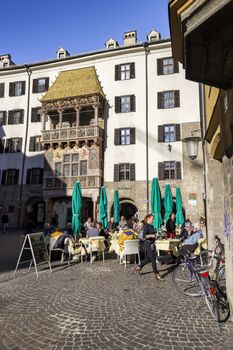 INNSBRUCK, AUSTRIA – NOVEMBER 1st 2015: The Golden Roof, completed in 1500, ornamented with 2,738 fire-gilded copper tiles for Emperor Maximilian I to mark his wedding to Bianca Sforza