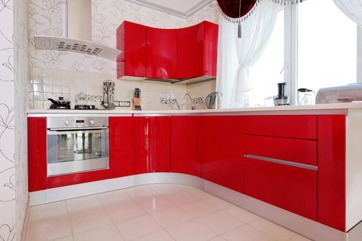 Modern glossy kitchen interior cabinet closeup