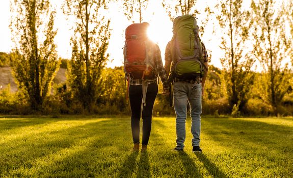 Shot of a young couple with backpacks ready for camping