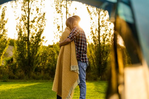 Young couple in love after waking up in the nature