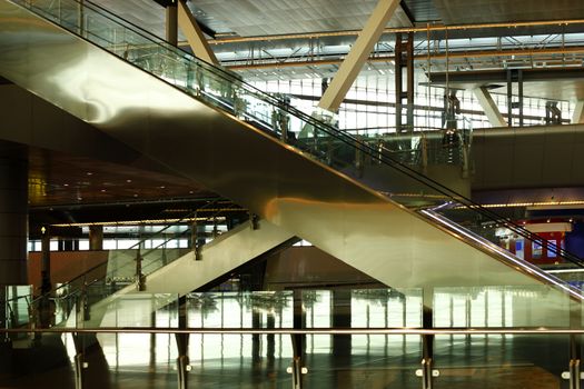 Escalator for passengers in the lobby of the airport in Doha